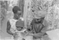 PAIGC soldier with his family in a military camp, Guinea-Bissau, 1974