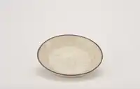 Northern Song dynasty stoneware dish highlighted in The Macau Museum in Lisbon, Portugal
